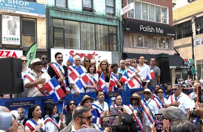 Domincan Day Parade dazzles mega multitudes in Midtown. Mayor Mamani and Adriano Espaillat, in green shirt right, are not talking.