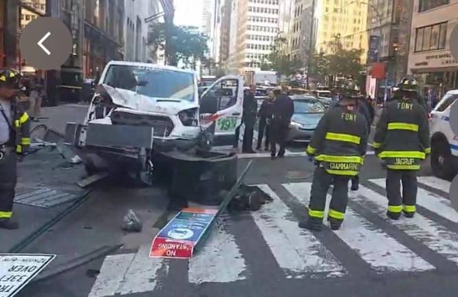 A U-Haul delivery van allegedly driven by an 86-year-old man came to a halt on East 57th St. on Oct. 21, but not before hitting two cars, driving onto the sidewalk and crushing three mail relay boxes, knocking over a LinkNYC wifi kiosk, and hitting a fire hydrant. Also, a female pedestrian was hit by the falling bus sign.