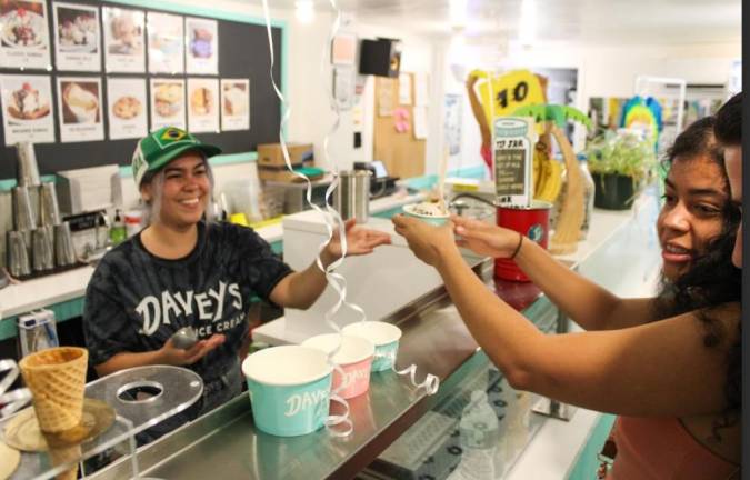 Once inside, loyal patrons were rewarded with a free cup of custom made ice cream. Photo: Vic Verbalaitis