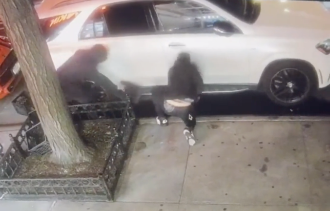 In the dark: hoodie-clad wheel thieves near the southeast corner of Third Avenue and East 89th, July 11 (incident No. 13, below).