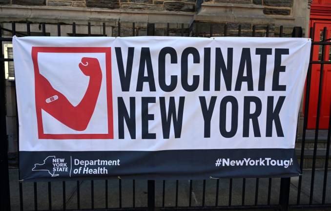 Vaccination sign in Harlem. Photo: Kevin P. Coughlin / Office of Governor Andrew M. Cuomo