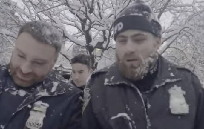 Social media videos show police getting pelted with snowballs after they began retreating to the perimeter of Washington Square Park in Greenwich Village.