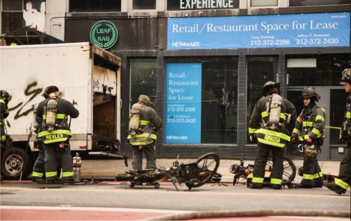 About a half dozen charred JOCO e-bikes were pulled from the back of the cargo truck where the fire erupted on July 5.