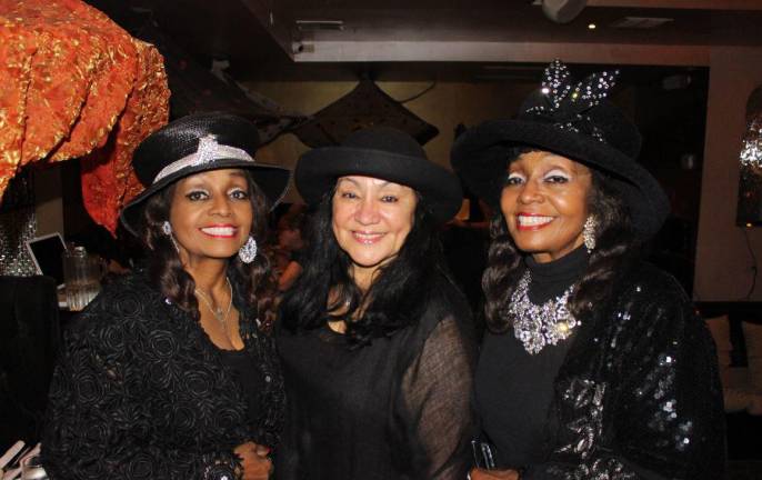 State Board of Regents Chancellor Betty Rosa (center), flanked by sisters and educators Audrey (left) and Geraldine Baker, at the June 19 fundraiser for Class Size Matters.