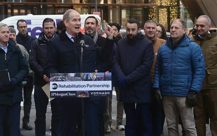 MTA Chair and CEO Janno Lieber (at mic) announces public private partnerships with JP Morgan Chase and Vornado Realty Trust to make necessary repairs to the Grand Central Terminal train shed that runs beneath Park Avenue on Tuesday, Dec 16.