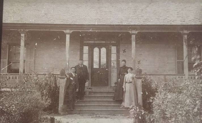 Mirielle Clifford's great-great grandparents on the porch of their house in Carencro, Louisiana. Photo courtesy of Mirielle Clifford