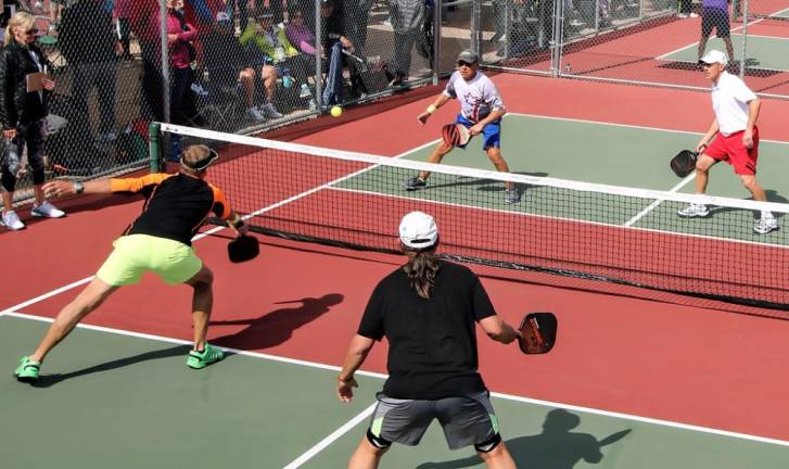 Pickleball, a sport similar to badminton and tennis, has grown steadily in popularity over recent decades. Wollman Rink this spring and summer will host fourteen pickleball courts for New Yorkers to enjoy. <b>Photo: Flickr.</b>