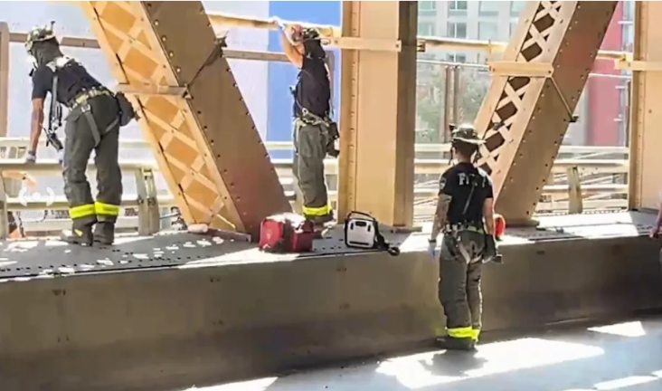 FDNY firefighters respond to a head on collision involving two bikers on the Queensboro Bridge. One victim was driving a stand up scooter, the other was driving a light weight racing bike. Both were rushed to a nearby hospital and pronounced dead.