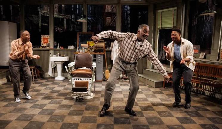 Norm Lewis (center) with actors playing his two unemployed sons, Jeremiah Packer (left) and Bryce Michael Wood.