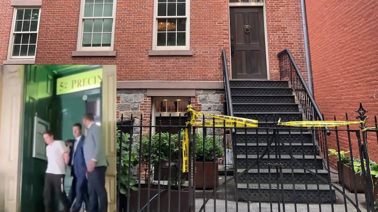 The Prince Street condo building where John Woeltz (seen being escorted from building in lower left) allegedly sought a man’s crypto password.