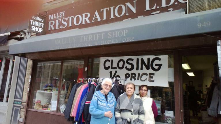 Leonia Sagasta, Myrta Maldonado and Georgina Olivo in front of Valley Restoration Local Development Corporation&#x2019;s thrift store, which is set to close at the end of March. Photo by Mickey Kramer