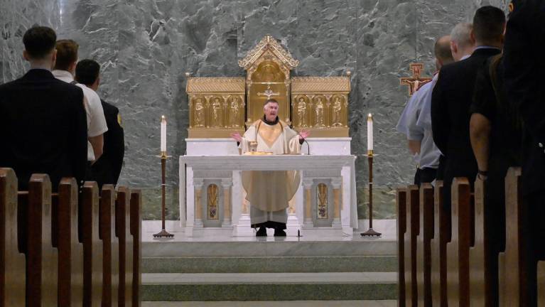 Firefighters mass at St. Francis of Assisi R.C. Church, Sept. 11, 2025. The church became a hub for 9/11 remembrances because it was the parish of Father Mychal Judge, the FDNY chaplain who was identified as victim No. 1 on 9/11/2001.