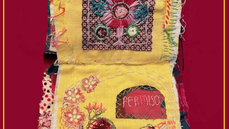 Image of embroidered art that artist Alison J. Stein is stitching into a book. Photo: Alison J. Stein