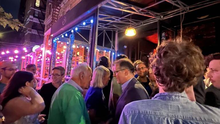 Supporters, campaigners, and elected endorsers all assemble at Micah Lasher’s watch party at E’s Bar on June 25.