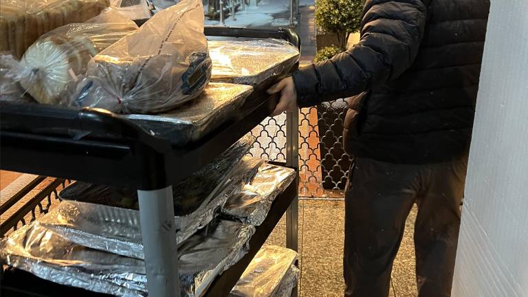 Dino Redzic, the operator of Uncle Paul’s Pizza, helped deliver 500 pizza pies to essential workers during the great NYC blizzard of 2026.