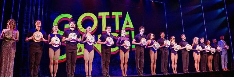 The cast of GOTTA DANCE!, at the opening night curtain call.