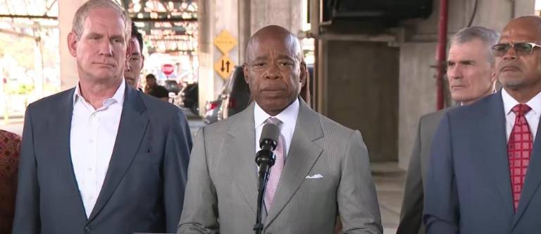 From left to right: MTA Chair Janno Lieber, Mayor Eric Adams, &amp; DOE Chancellor David C. Banks. They helmed a September 5 press conference declaring a public info war on subway surfing.