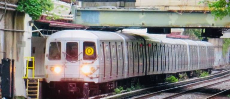 People taking the Q train from Manhattan to Brooklyn may have to rely on the dreaded shuttle bus for part of the trip on weekends in January. Photo: Ralph Spielman