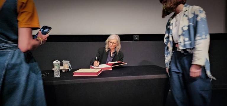 Annie Leibovitz signs copies of Wonderland at SVA Theatre. Photo courtesy of Travis Keyes, APA-NY