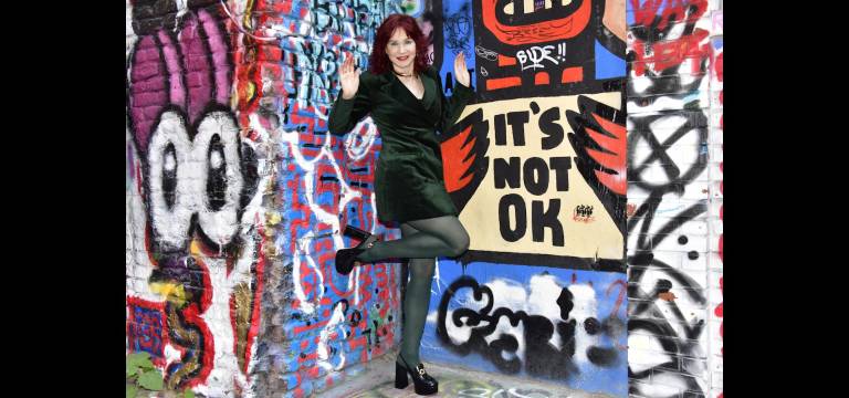 Karen Rempel surrenders to being immersed in graffiti in Freeman Alley.