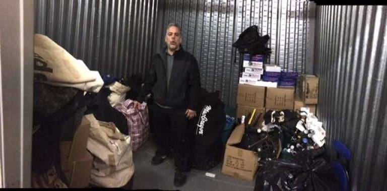 Jos&#xe9; Aguilera inside the storage locker that holds the West Side Little League&#x2019;s gear. Much of what&#x2019;s pictured is headed to Cuba and that country&#x2019;s baseball fields. Photo: Steve Malley.