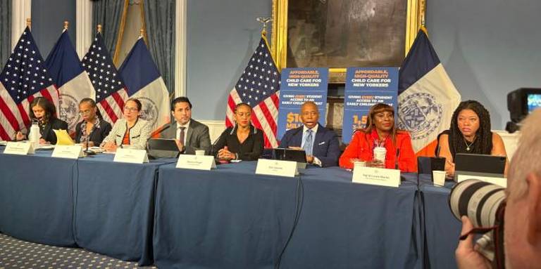 Until her resignation last December, deputy mayor Ingrid Lewis-Martin (red jacket) was constantly by the side of Mayor Eric Adams as seen here during a September 2024 press briefing. Most of the top aides who used to join Adams at his weekly press briefings have resigned. Deputy Mayor and Communications Director Fabien Levy (second from left of Adams) remains.
