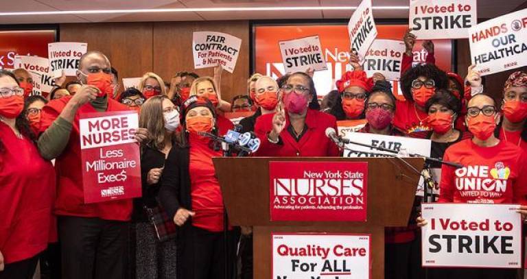NYSNA president Nancy Hagans (at podium) had settled with seven hospitals before leading two others on a three day strike at two big hospitals that ended on Jan. 11. Photo: NYNSA web site.