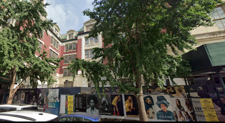 A landmarked French Renaissance style building in the East Village at 605 E. 9th St., once was the site of P.S. 64. When the school closed in the late 1970s, Charas/El Bohio Community Center took over but was evicted in 2001. by landlord Gregg Singer. More recently, Madison Realty Capital forclosed on the now abandoned building. As lawsuits and protests continue, the scaffolding remains up.