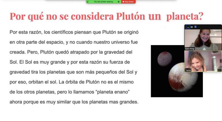 The author and Taylor (inset) learning in Spanish about why Pluto isn’t considered a planet. Photo courtesy of Curious Cardinals