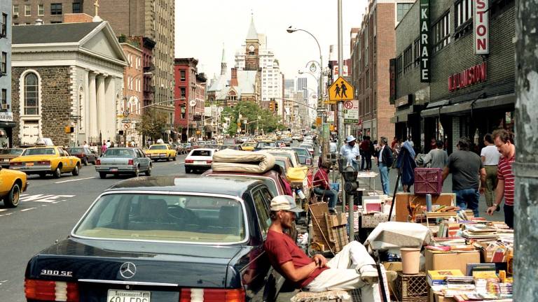 Traffic coursing through Sixth Avenue in Greenwich Village in 1987. Photo by Greg Wass, via Flickr