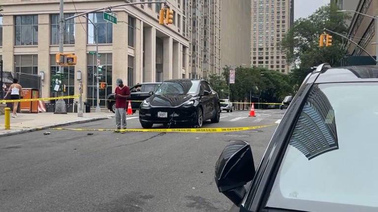 Doreen Meyers, riding a stand-up e-scooter, was killed near West 60th Street and Amsterdam Ave. after colliding with black Tesla car.