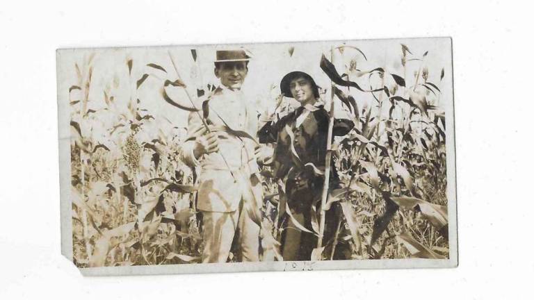 Playwright Alice Eve Cohen’s ancestors in a cornfield on their farm in Oklahoma. Photo courtesy of Alice Eve Cohen