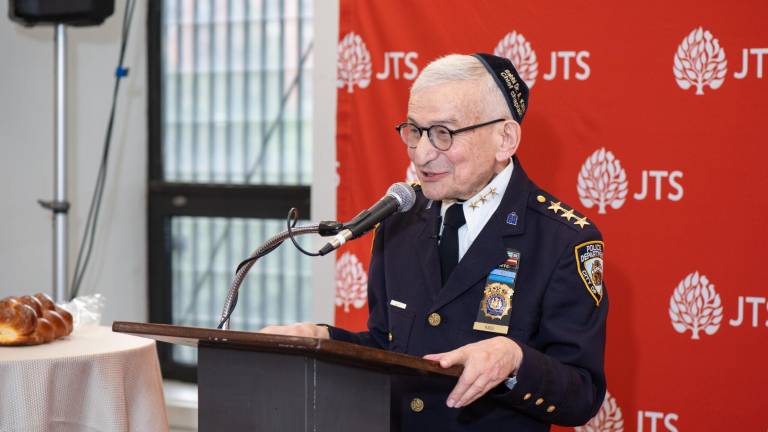 Challah left, Alvin Kass right: His kippah, or yarmulke, is embroidered “Rabbi Dr. A. Kass, Chief Chaplain.”