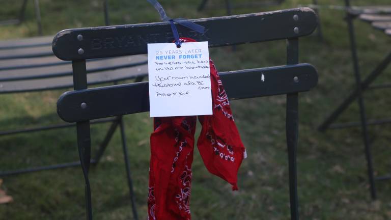 On one chair, a red bandana and note commemorated the life of Welles Crowther, a stock trader and volunteer firefighter who saved as many as 18 lives before he died in the South Tower.