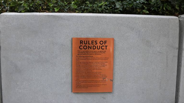 Several plaques throughout the space denote its status as a privately owned public space. However, Wade said the building’s staff members disregarded these.