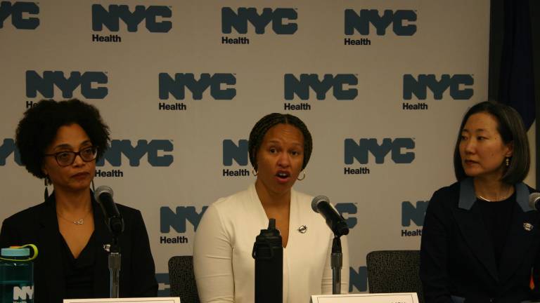 Michelle Morse (center) acting City Health Commissioner is still urging people to get vaccinated. While flu cases declined slightly the past two weeks, there have been over 128.000 hospitalized with flu this season. And the flu season will stretch into May.