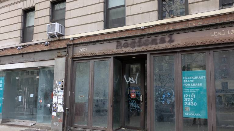 Once home to Italian restaurant Regional, 2607 Broadway is now graffiti covered.