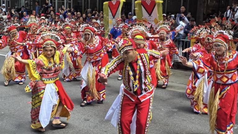 Exuberantly costumed dancers in the Philippine parade on Madison Avenue.