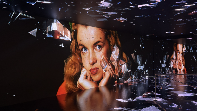 The penultimate space in the “Manifesting Marilyn: The Making of an Icon” exhibition is a cinematic installation tracing the star’s evolution from Norma Jeane Mortenson.