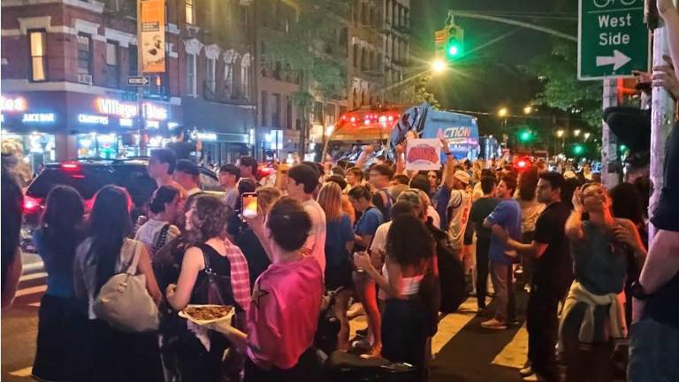 Traffic was temporarily blocked on Avenue A with fans chanting “Knicks, Knicks, Knicks” and “Go New York, Go New York, Go!” after the home teams miraculous win over the Spurs in Game 4 of the NBA Playoffs.