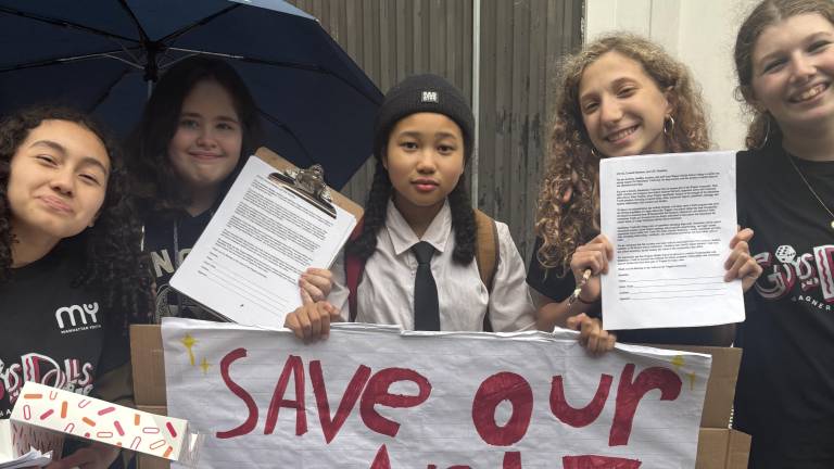 Middle School Students seek signatures to a petition to the Department of Education, urging the city restore the provider of its after school arts program. The DOE is switching from Manhattan Youth to another provider, irking parents