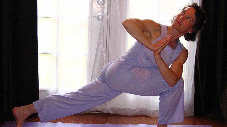 This woman is engaged in a form of lunge, which is one of four routines that AARP says can be combined with three other exercise routines to reap the same benefits as running a mile.