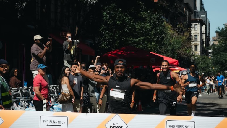 Akinola Raymond wins the 100 meter dash and earns $4,000 in a “Who Runs NYC” race staged by Nike in which it said the winner