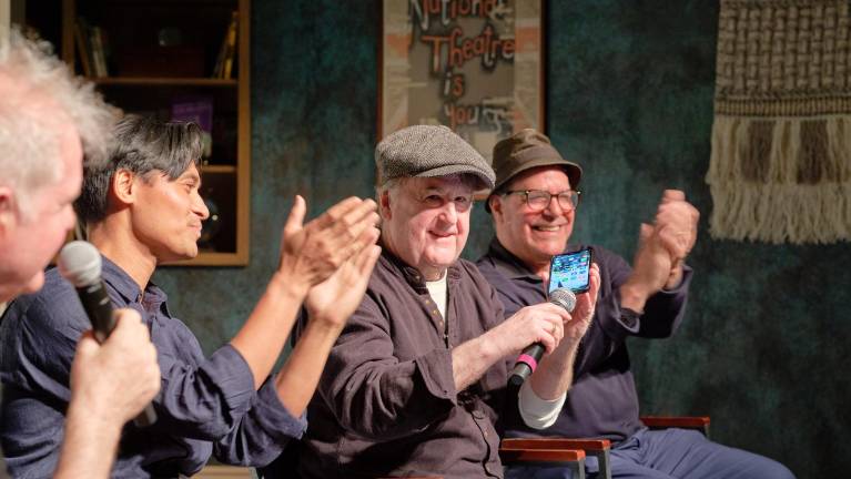 Director Anthony DiMieri phoned in while in the back of a yellow cab to join the Q&amp;A with the show’s stars including cab drivers John McDonagh (second from right) and Seth Goldman (far right) on the stage.