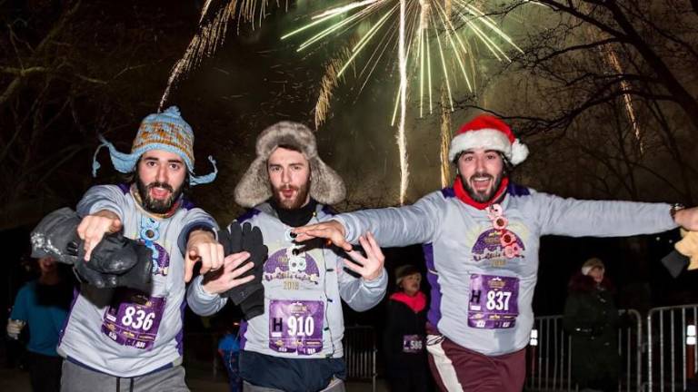 Fireworks and costumes marked the four-mile New York Road Runners Club’s annual Midnight Run in Central Park that began counting down at 11:59 p.m. on Dec. 31 and went off precisely at the stroke of midnight.