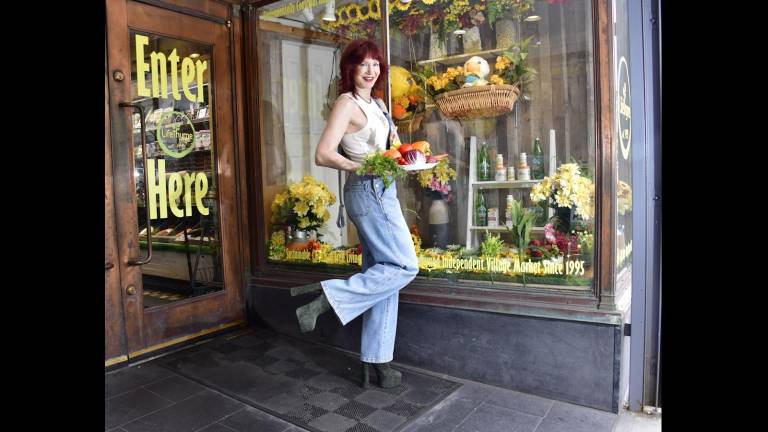Karen Rempel offers a selection of LifeThyme’s enticing produce.