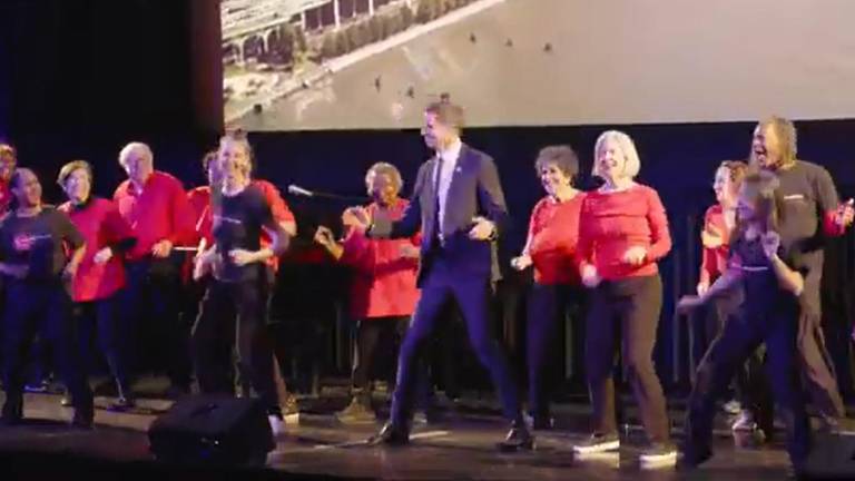 New York State Senator Erik Bottcher busting a move with a troupe from Dances for a Variable Population, at his inauguration ceremony at the American Musuem of Natural History.